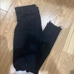 Mother jeans holes in knees and frays at ankle